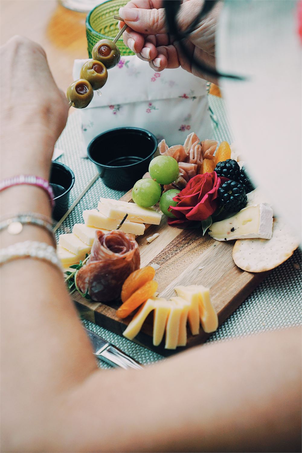 Guests at a hosted Graze & Gather charcuterie class